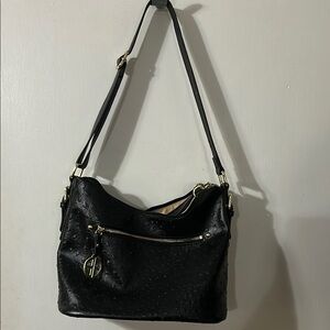 Black Slouchy Shoulder Bag with Adjustable Strap and Shiny Finish